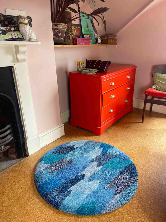 'Deep' Hand tufted blue small tufted circular rug