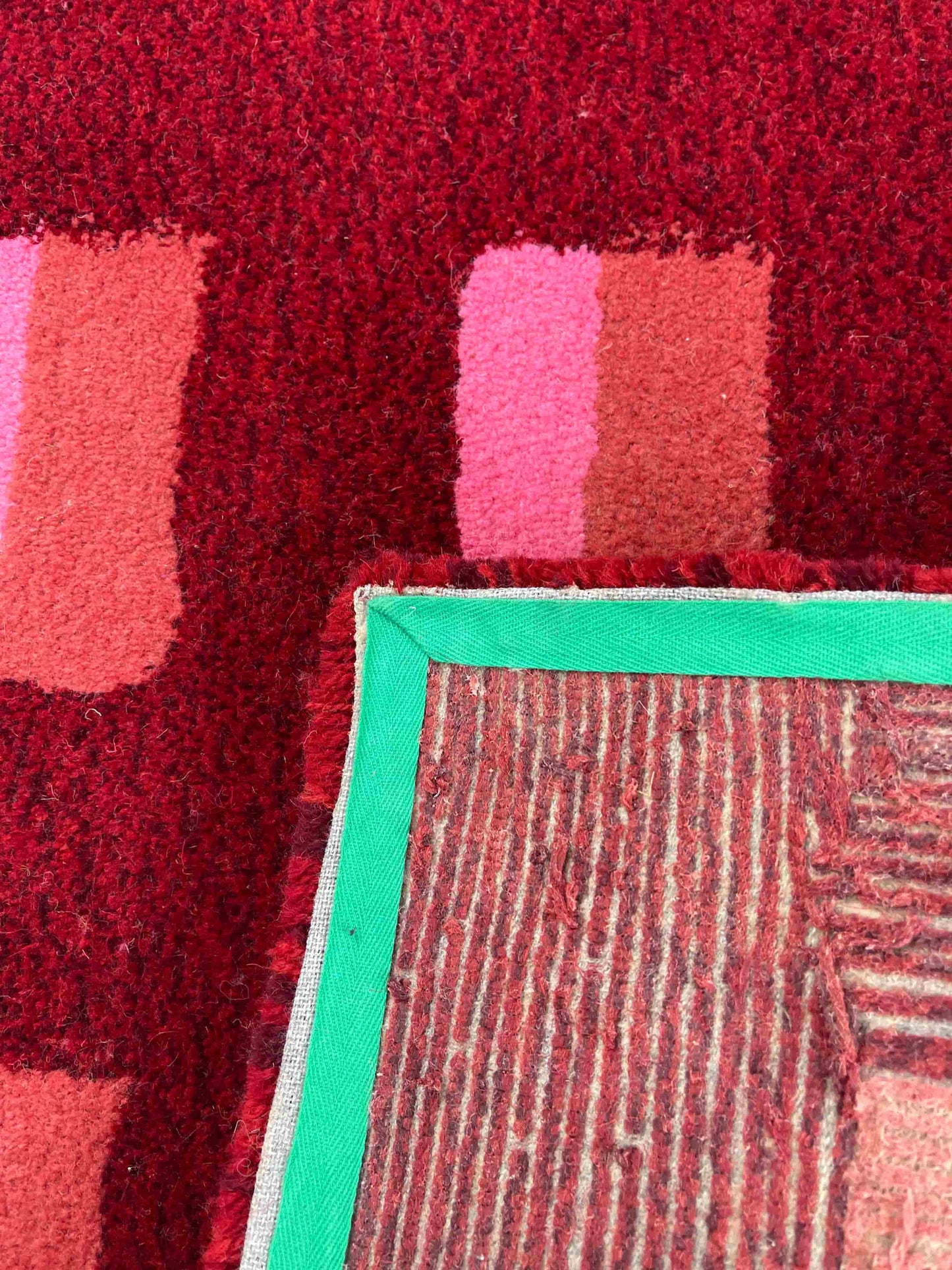 'Mulled' Hand tufted red, pink and burgundy small tufted rug