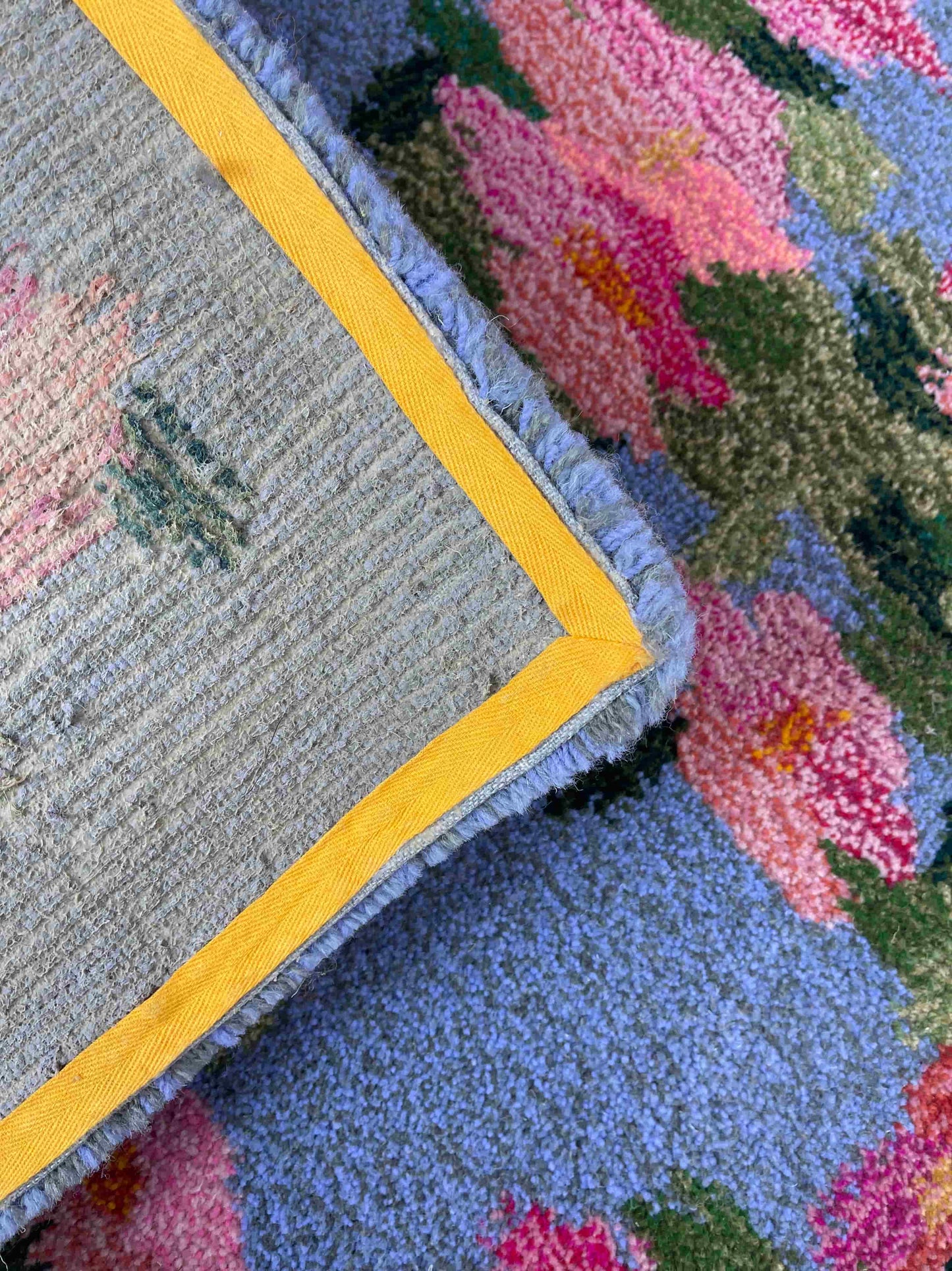 'Pomponella' Hand tufted floral lilac and pink large tufted rug