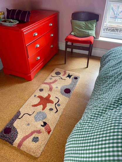 'Abyss' Star Fish sandy yellow tufted rug