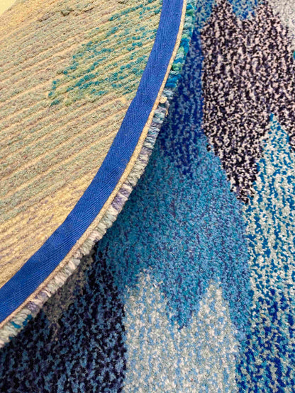 'Deep' Hand tufted blue small tufted circular rug