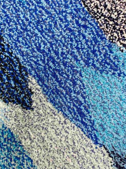 'Deep' Hand tufted blue small tufted circular rug