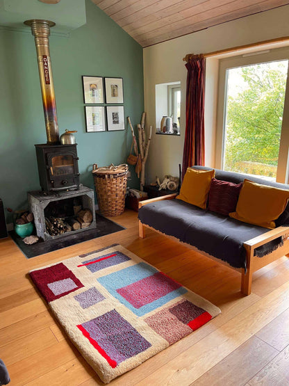 'Dulce de leche' Hand tufted cream, blue red medium tufted rug