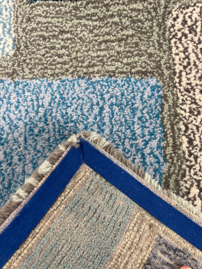 'December' Hand tufted light blue and cream small tufted rug