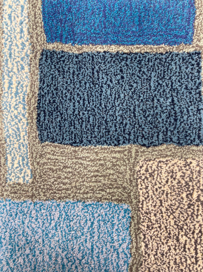 'December' Hand tufted light blue and cream small tufted rug