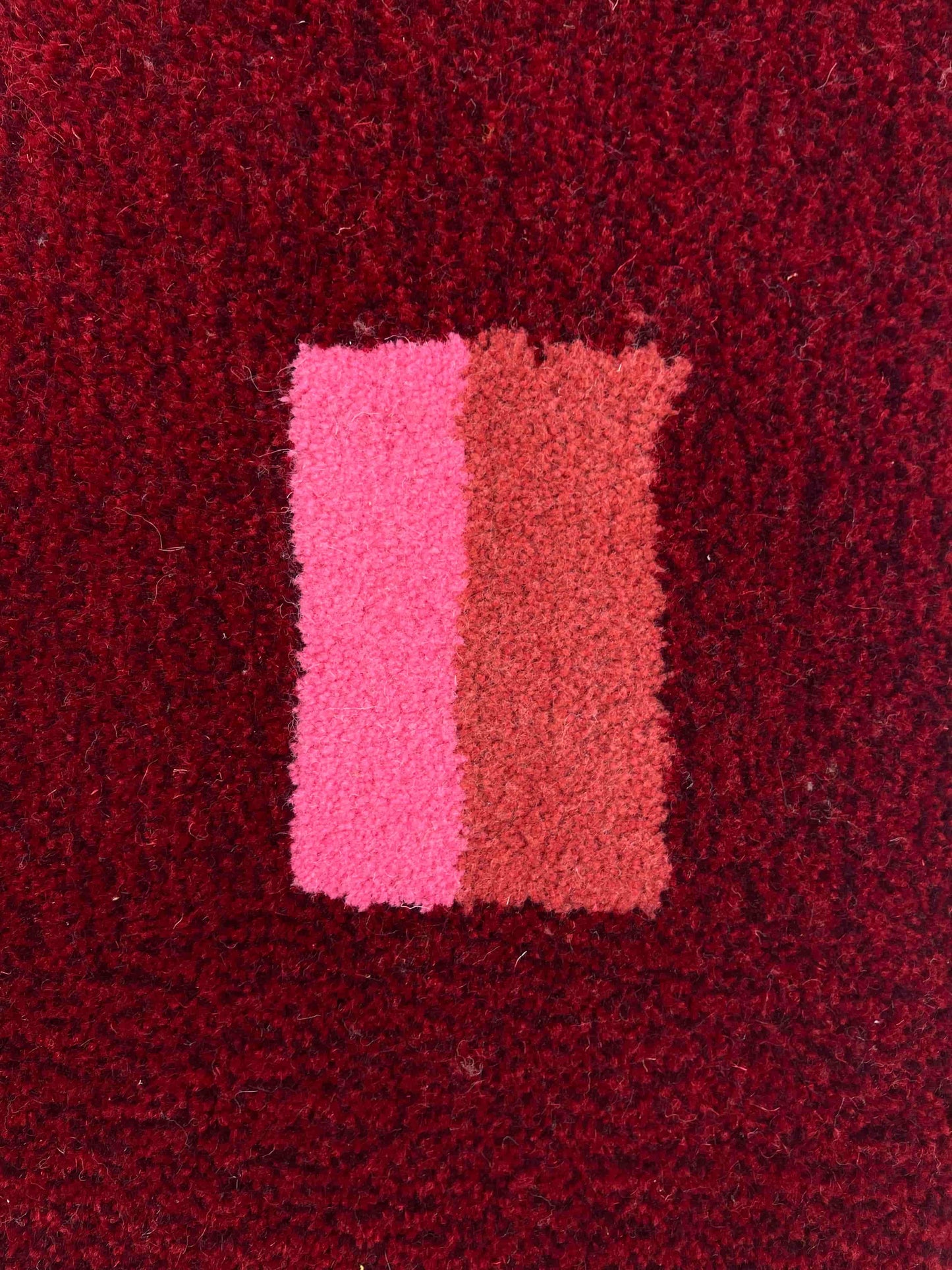 'Mulled' Hand tufted red, pink and burgundy small tufted rug