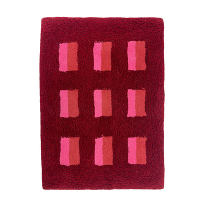 'Mulled' Hand tufted red, pink and burgundy small tufted rug