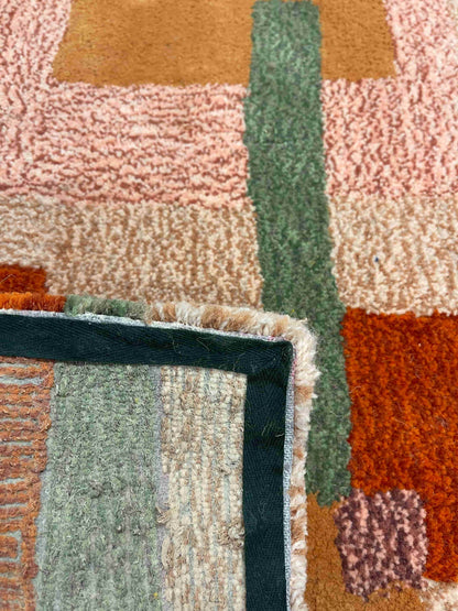 'Quartz' Hand tufted cream, peach, pink and yellow medium tufted rug