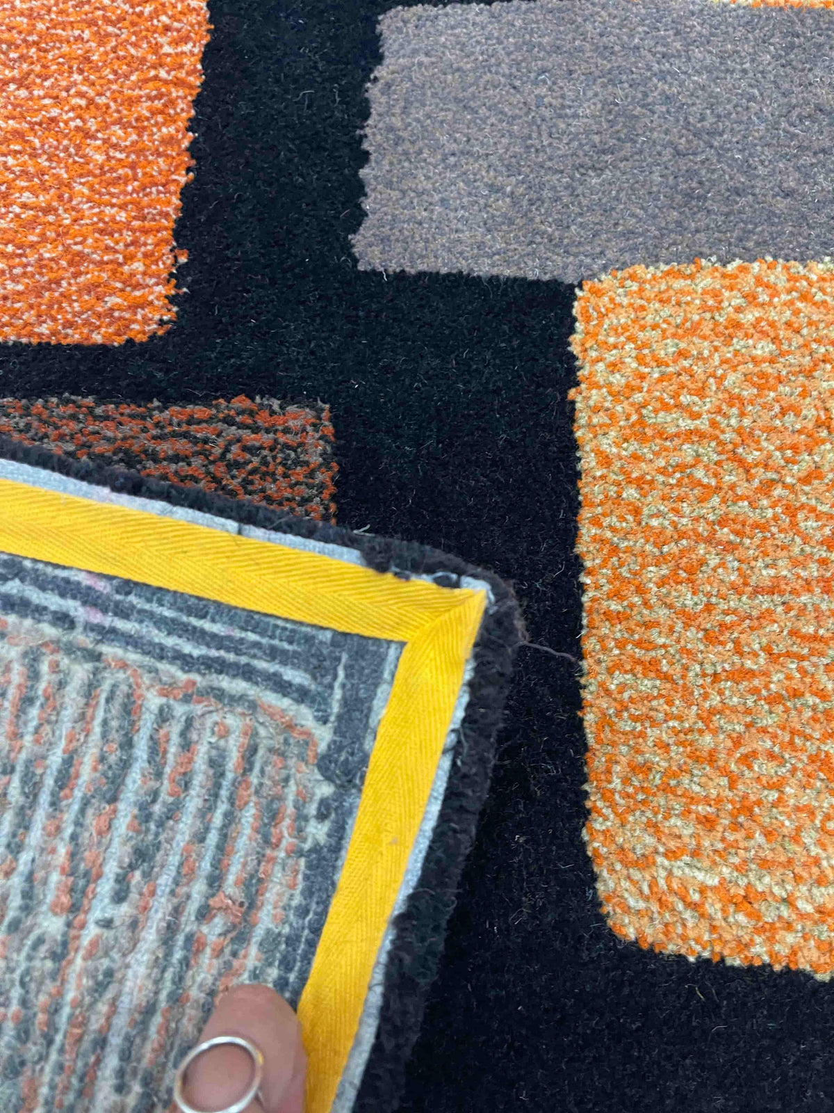 'Thunder' Hand tufted black, orange and mustard tufted rug