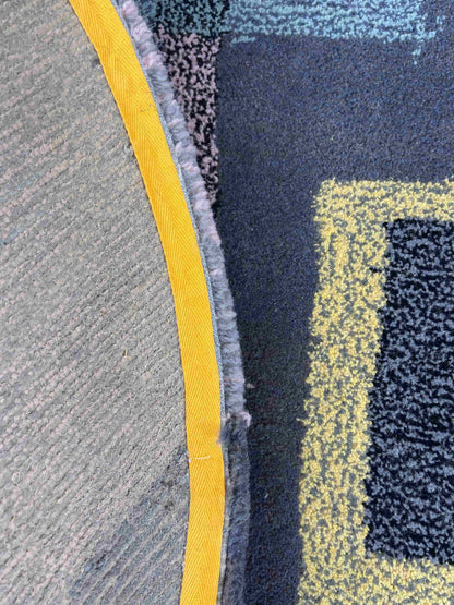 'Smog' Hand tufted grey pastel pink and yellow round small tufted rug