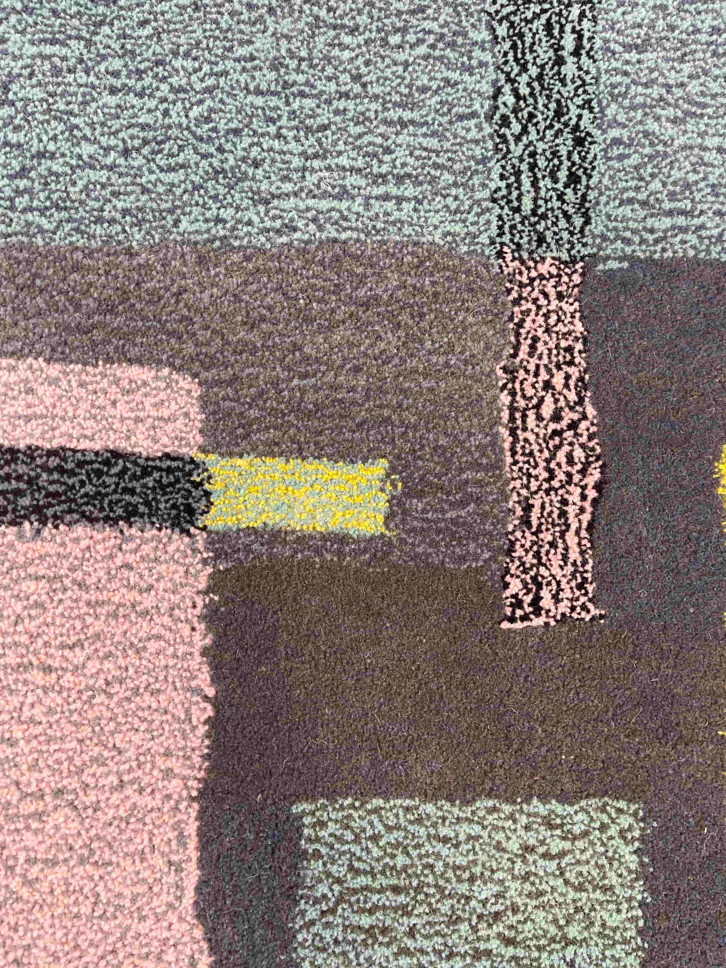 'Smog' Hand tufted grey pastel pink and yellow round small tufted rug