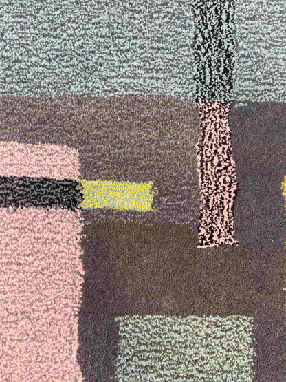 'Smog' Hand tufted grey pastel pink and yellow round small tufted rug