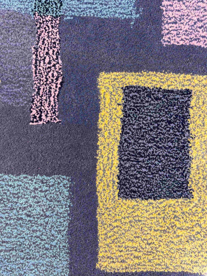 'Smog' Hand tufted grey pastel pink and yellow round small tufted rug